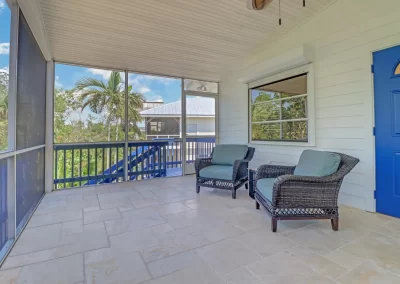 Flamingo Harbor screened veranda sitting area