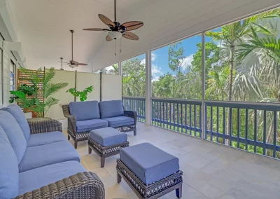 Flamingo Harbor screened veranda sitting area